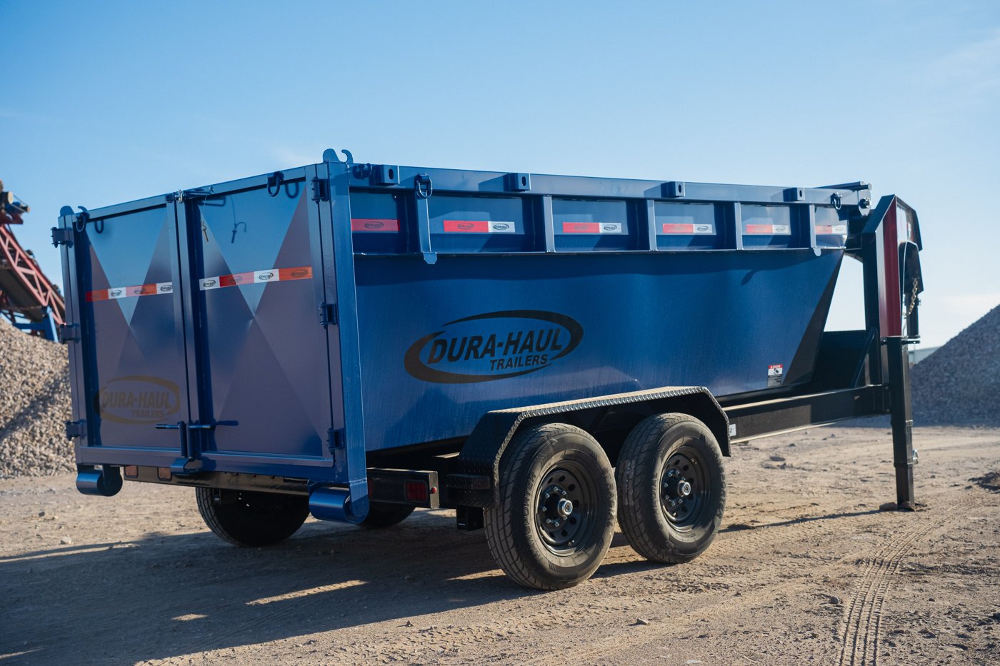 Roll-off trailer with a container box on the lot at Trailer Professionals